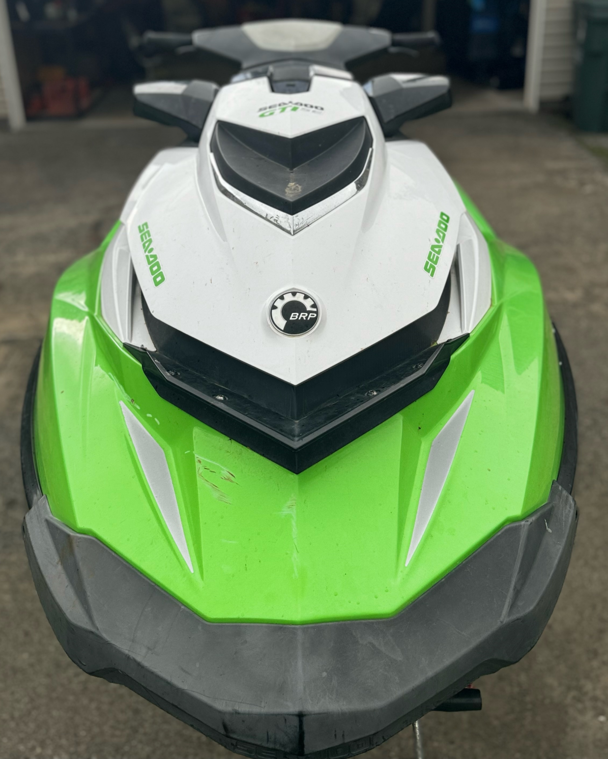 jet ski front with fading, dents, scratches, and fading