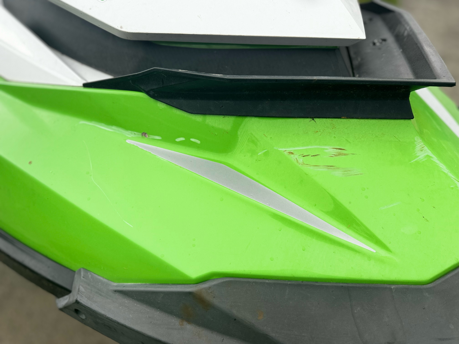 jet ski tail showing dents and aging